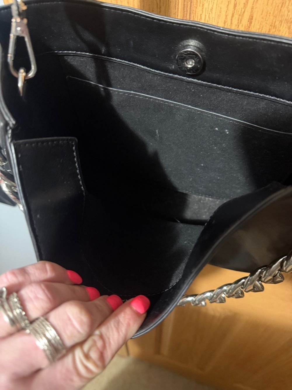 Black Leather Crossbody Bag with Silver Chain Accent - Picture 3 of 8